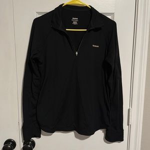 EUC Reebok black pullover quarter zip front with zipper pocket on left arm